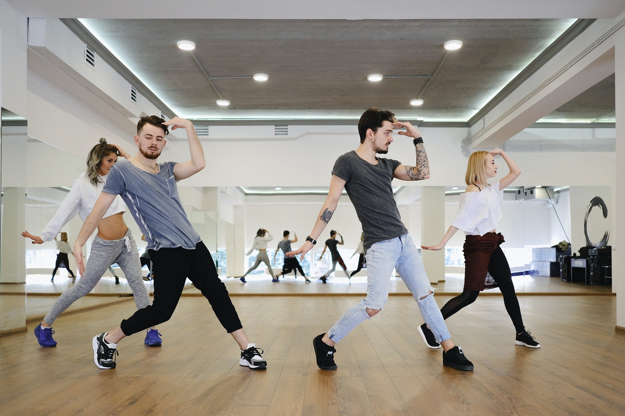 group-of-young-modern-dancers-dancing-in-the-studio.jpg